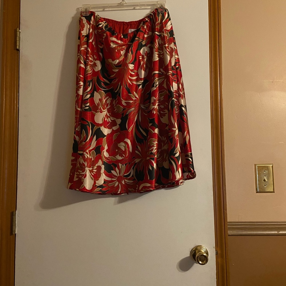 Red, black, gold and cream skirt suit